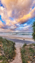 Tallow Beach at Byron Bay with vibrant pink sunset