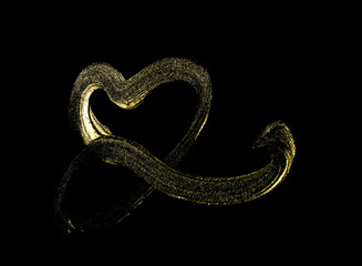 Golden brush stroke texture design isolated on black background. Realistic mascara golden smear template with clipping path.	