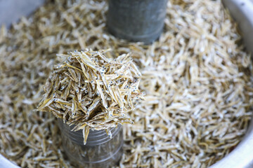 Small dried anchovy fish in street shop for sale	
