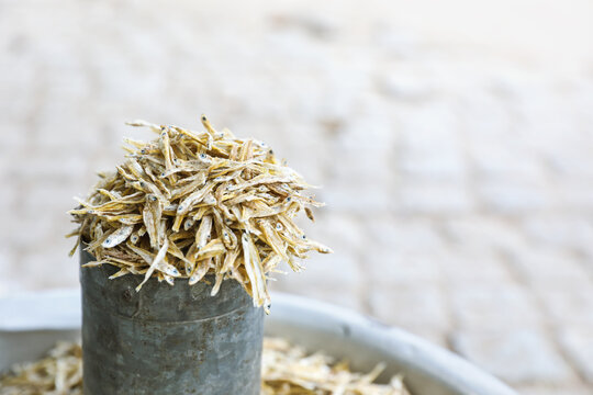 Small dried anchovy fish in street shop for sale