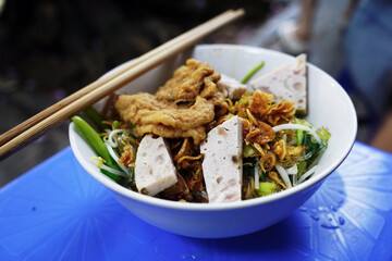 Mixed vermicelli sold as street foods in Ha Noi, Vietnam                              