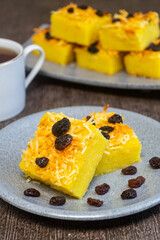 prol tape with cheese and raisin topping. traditional Indonesian food. made from cassava tape...