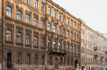 City street of St. Petersburg in the evening. Historic facades of houses at sunset.