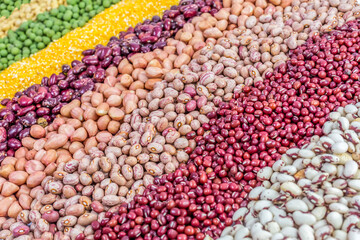 Fototapeta premium Autumn harvest of grain grain, full screen of whole grains.