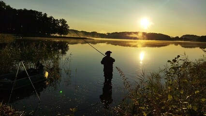 fishing at sunset