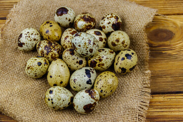 Quail eggs on a wooden table