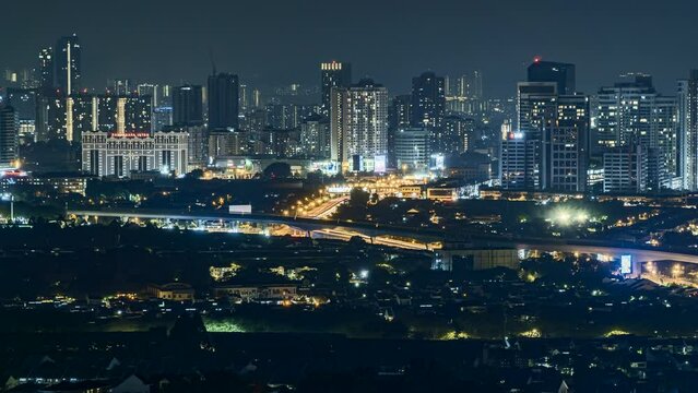 Timelapse 4k UHD footage of cityscape of Kuala Lumpur during sunrise and moving car time-lapse