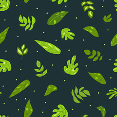 Obraz na płótnie Canvas Green leaves on a dark background. Seamless pattern