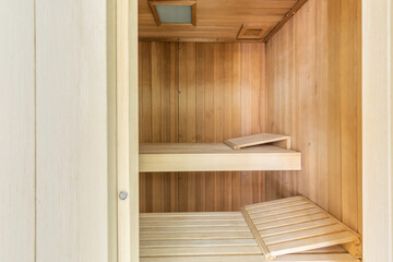 Fototapeta na wymiar Interior of an empty wooden sauna