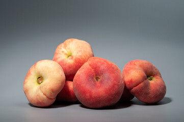 Fig peach on gray background, group