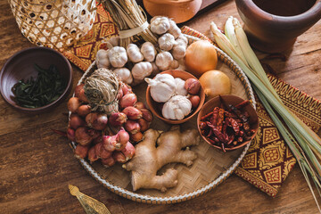 Various fresh vegetables and spices on wooden table, Thai food concept