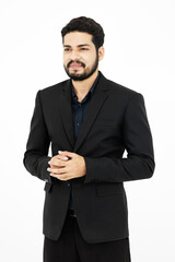 Portrait studio shot of Millennial Indian bearded male professional successful businessman ceo entrepreneur in formal suit standing on white background.