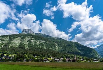 Beautiful idyllic panorama view of Altaussee town with the peak Loser in background on a sunny summer day with blue sky cloud, Styria, Austria - 517316831