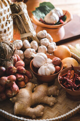 Various fresh vegetables and spices on wooden table, Thai food concept