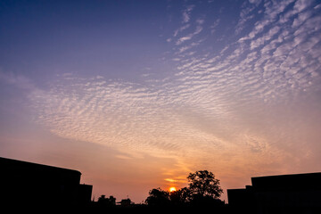 Naklejka premium Amazing cloud formation in colourful sky during a monsoon sunrise morning