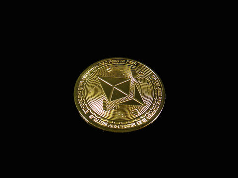 Kaohsiung, Taiwan, May 26, 2022:Ethereum coin closeup isolated on black background. ETH Obverse - Obverse   