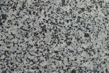 Close shot of black and white polished granite stone