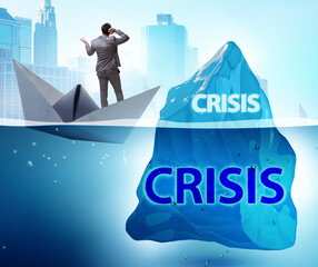 Crisis concept with businessman on iceberg