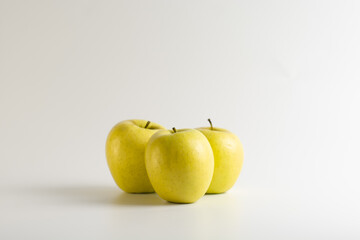 three yellow apples isolated apples on white background 