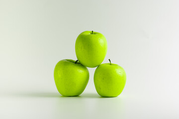 three green apples isolated apples on white background pyramid of apples