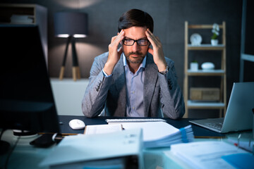 Stressed Tax Advisor With Headache