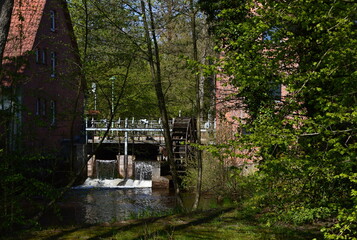 Fototapeta na wymiar Historical Water Mill at the River Böhme in the Town Soltau, Lower Saxony