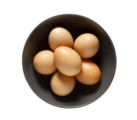 Eggs chicken whole beige in bowl, isolated on white background with clipping path.