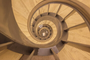 selective focus on the base of spiral staircase