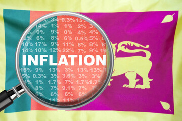 Magnifying glass focused on the word inflation on Sri Lanka flag background. Hike interest rate....