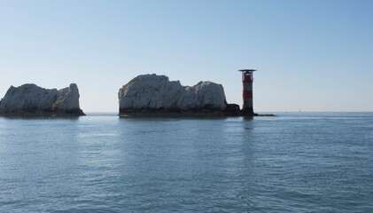 The Needles lighthouse filmed from a yacht on a very calm sunny day plus 2 of the chalk stacks on...