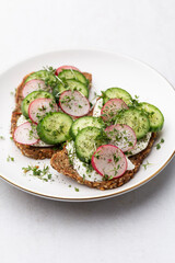 Keto Toasts with cucumber, egg, mozzarella and microgreens.