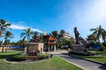 Fototapeta na wymiar Si Racha District, Thailand, June 27, 2022. Wat Ko Loi (Koh Loy Temple) in Ko Loi Island at Si Racha District, Chonburi province Thailand.