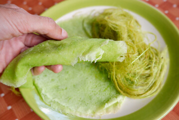 Thai cotton candy burrito pancake, Roti Saimai (Cotton candy) is Thai Dessert.