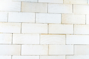 Fragment of a wall made of aerated concrete blocks. flat lay frame