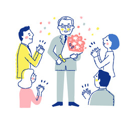 定年退職する男性と労う職場の人々