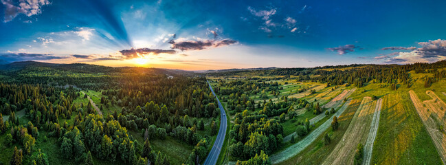 Drone panorama of sunset over rural countryside in Podhale, Poland © marcin jucha