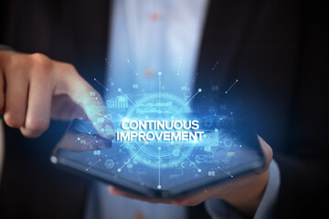 Businessman holding a foldable smartphone, new business concept