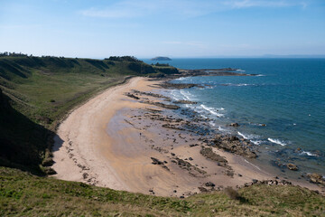 empty Canty Bay sandy beach in East Lothian, Scotland on a nice warm day 