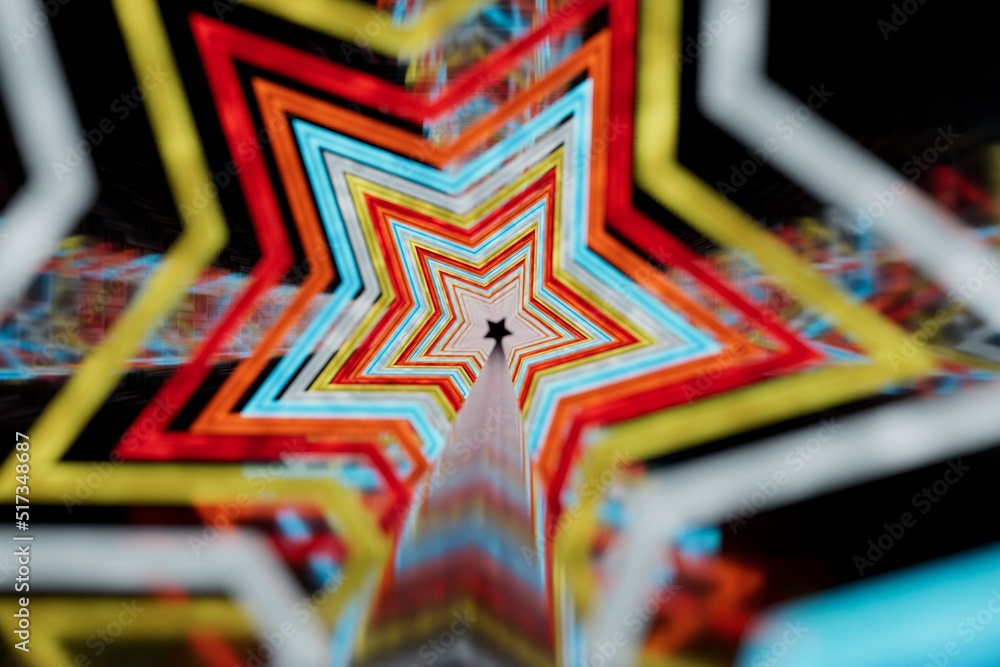Poster abstract background. a beautiful tunnel of patterns of stars of different colors on a black backgrou