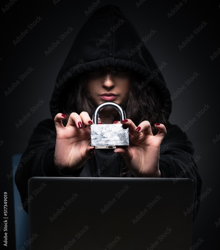 Poster female hacker hacking security firewall late in office