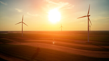 Windmill farm park and turbines for producing green electricity.