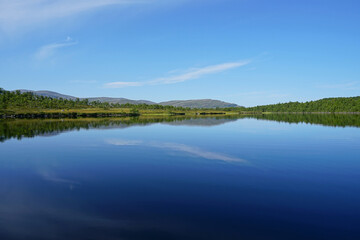 Fototapeta na wymiar Reflection lake in north Sweden.