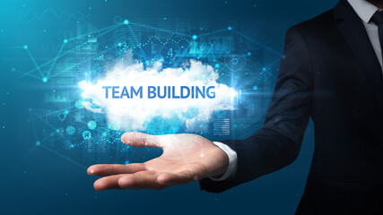 Hand of Businessman holding motivational message