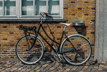 Fototapeta na wymiar A bike in Copenhangen during a sunny summer day