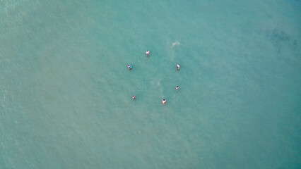 aerial view of people playing on the beach