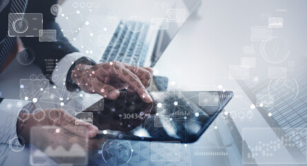 Data science technology, big data analysis, business intelligence concept, market research. Businessman working on laptop computer, using digital tablet with big data, global business network