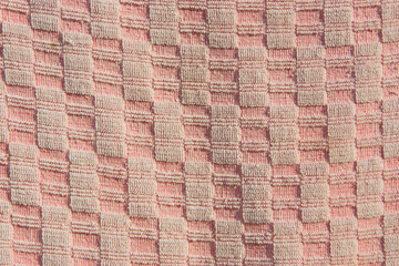 Abstract pink pastel towel with a pattern of squares