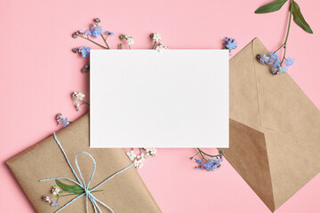 Greeting blank card mockup with gift amd envelope
