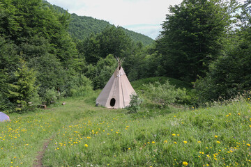 wigwam on a mountain meadow.. © Alla