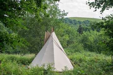 wigwam on a mountain meadow..